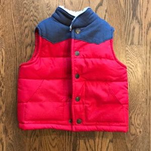Excellent condition. Red and grey puffer vest.